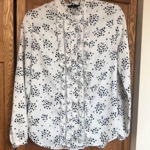White ruffle blouse